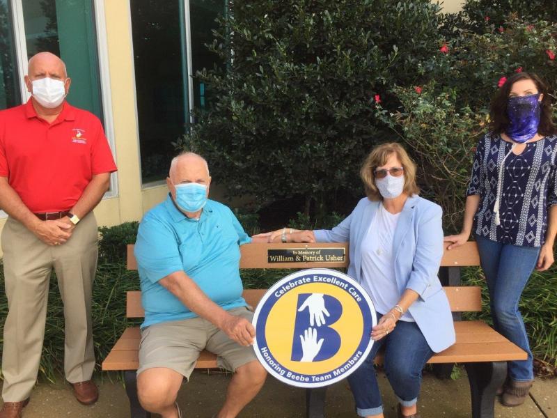 Two benches and perennial plantings were recently donated to Tunnell Cancer Center by Richard and Beth Plaskus in memory of William and Patrick Usher. Beebe Medical Foundation President Tom Protack thanks (l-r) Richard and Beth Plaskus for their tribute gift and Stacie Venables of East Coast Garden Center for designing the new perennial garden. SUBMITTED PHOTO